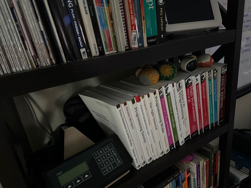 a portion of a bookshelf